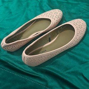 Cute comfy peachy pink flats.